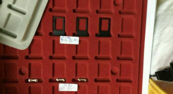 iPhone 7 : photos du tiroir SIM Noir Sidéral et de la carte mère